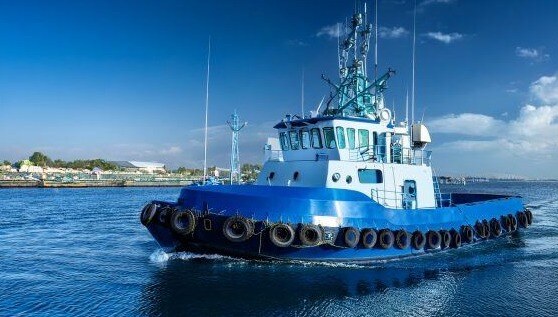 Firefly-modern-blue-tug-boat-with-electric-bolt-on-side-2096-570x400-1
